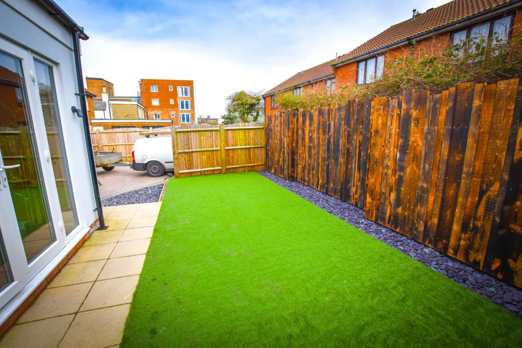 A lawn and fence